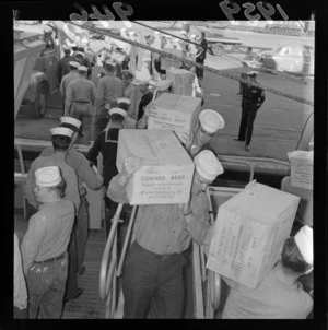 American sailors loading meat for Niue Relief