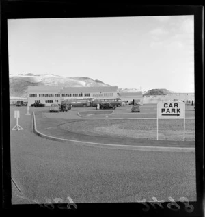 Wellington Airport, Rongotai, showing carpark and terminal building, with buses parked at front