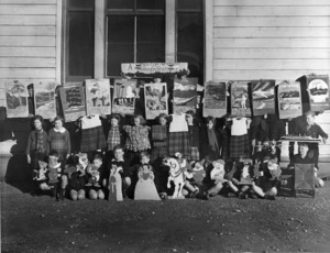 Children from a Westport school with posters and cartoons that they have made
