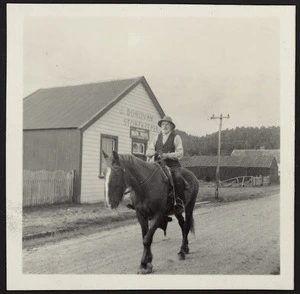 Jimmy Donovan riding a horse, Okarito