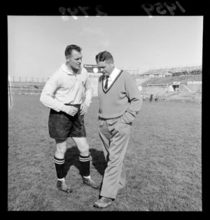 Mr JR Sullivan, coach, and an unidentified members of the All Blacks rugby team, at Athletic Park, Berhampore, Wellington