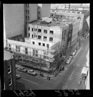 'Aubrey Gualter' building, on corner of Featherston Street and Brandon Street, Wellington City, including a building in background with AMP Society billboard on facade