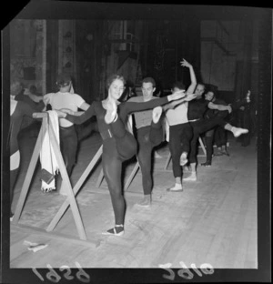 Russian ballet dancers [members of the Bolshoi Ballet company?] practising at the barre
