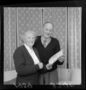 Mr 'Skip' Williams and his wife, holding a certificate from the Boy Scouts