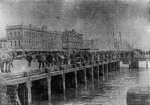 Men barricading an Auckland wharf during a strike in 1890