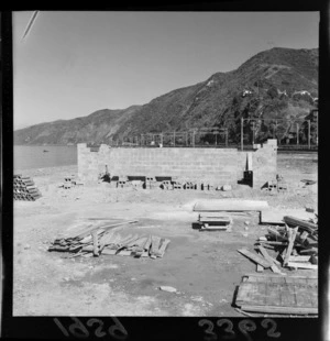 Water Ski Club, Petone, Wellington, including brick wall being built and Hutt Road in the background