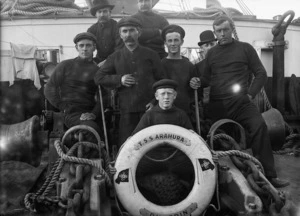 Unidentified men and boy, aboard the TSS Arahura