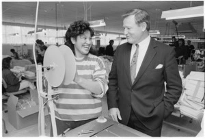 Opposition leader Jim Bolger with Rachael Hirini, an employee of clothing manufacturer L R Wishart Ltd, Levin - Photograph taken by Jon Hargest