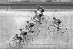 Racing cyclists at a velodrome