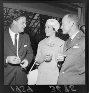 Group of unidentified guests at a cocktail reception for visiting airmen, at the British High Commissioner's home