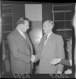 Mr F J Kitts and Mr E R Toop, shaking hands after mayoral elections, Wellington