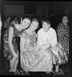 Ballet dancers at a Christmas party with three unidentified young women at an unknown indoor location, Wellington Region