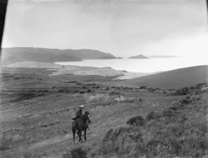 North Cape landscape with a man on his horse