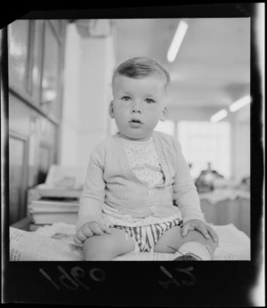 Portrait of Michael Fitzmaurice as a baby at an unknown indoor location, Wellington Region