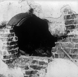 Hole in a brick wall caused by the 1931 Hawke's Bay earthquake