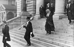 Speaker of the House, Charles Statham, and the mace bearer, on the steps of Parliament Buildings, Wellington