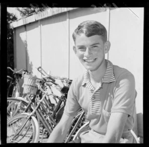 New Zealand junior tennis player with bicycles in background, Mitchell Park, Lower Hutt
