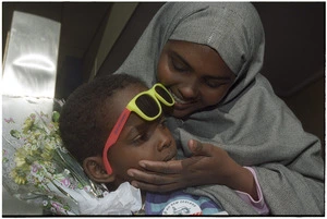 Somalian mother and son reunited in New Zealand - Photograph taken by John Nicholson