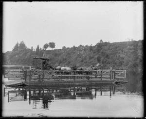 Ferry transporting horse-drawn cart over the Wairoa River, Hawke's Bay