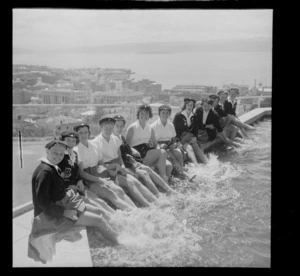 Girl's marching team from Auckland with feet in the water at the Kelburn fountain, Wellington