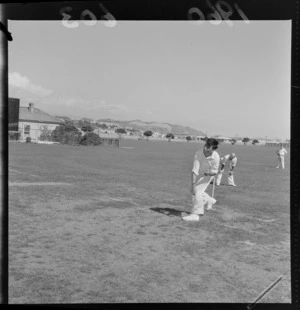 G A Bartlett bowling in cricket match, Wellington