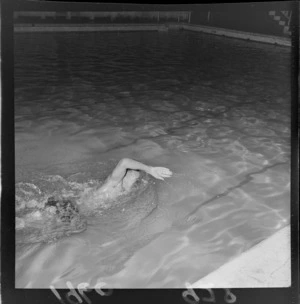 Swimmer Peter Hatch demonstrates overarm 'freestyle' swimming