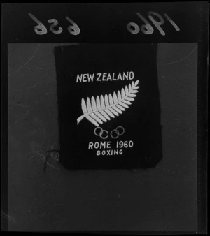 Close-up view of a blazer pocket monogram for the NZ Olympic Boxing Team to the 1960 Rome Olympics
