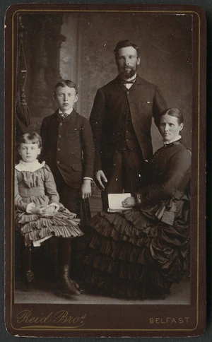 Reid Bros (Belfast) fl 1870s-1880s :Portrait of unidentified man, woman and two children (young boy and girl)