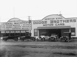 Dodge motorcars on display outside the business premises of Newton King, Stratford