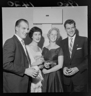 Unidentified students at ball, for Victoria University students, at Hutt Town Hall, Lower Hutt, Wellington