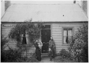 Nicol, Helen Lyster, 1854-1932: Photograph of Helen Nicol and family, outside her home, Dunedin