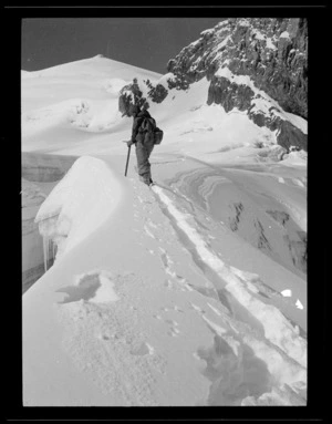 Yunnan, China. Fraser Radcliff and crevass near glacier camp. 1 November 1938.