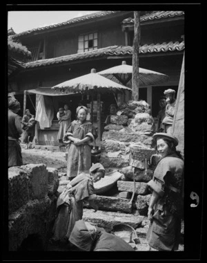 Yunnan, China. Naxi (Nashi) women near market square, Lijiang. September 1938.