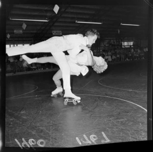 Two unidentified competitive skaters performing, at opening of 'Glide Rink' roller skating rink, Kilbirnie, Wellington