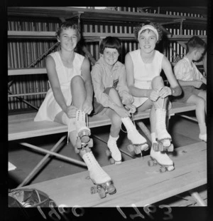 Three unidentified girls at opening of 'Glide Rink' roller skating rink, Kilbirnie, Wellington