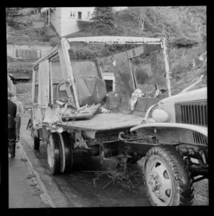 Night cart being towed away after it had fallen down a bank beside a house in Moffitt Street, Brooklyn, Wellington