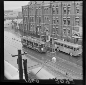 Tram and bus at the new Wellington city transport terminal at Lambton, Wellington in front of the Government Publications building