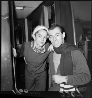 Portrait of Australian ballet dancers Kathleen Gorham and Robert Pomie getting off a tram, probably Wellington City