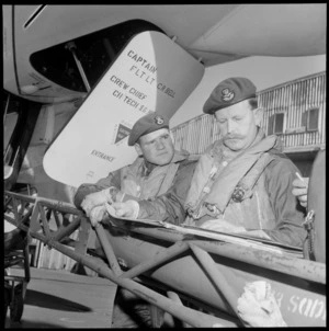 RAF Avro Vulcan XH498 Jet bomber plane with Captain Flight Lieutenant C R Bell and an unidentified crew member in full flight gear doing a post flight check, Ohakea Air Force Base, Palmerston North