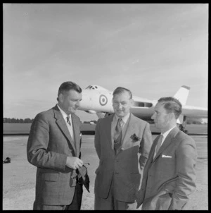 RAF Avro Vulcan XH498 Jet bomber plane with three unidentified men in front, Ohakea Air Force Base, Palmerston North