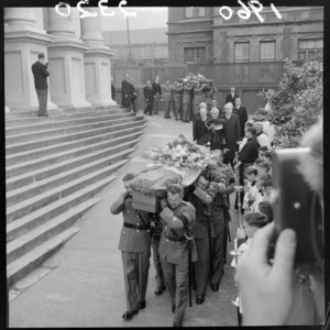 Funeral precession for an unidentified French Diplomat and his wife with a Military Officers and diplomats outside [Sacred Heart Cathedral?], Wellington City