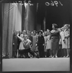 Ballet demonstration for an unidentified group of college girls by two Russian dancers on stage at the [State Opera House?], Wellington City