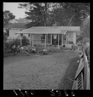 Days Bay Play Centre with unidentified children and teacher outside playing, Eastbourne, Lower Hutt, Wellington Region