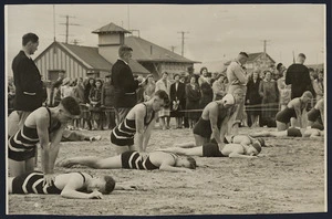 Men performing resuscitation at Centennial Championships, Lyall Bay