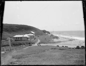 At Cable Bay, showing buildings