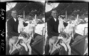 Unidentified man, with sled dogs, at Mount Cook National Park, Canterbury Region
