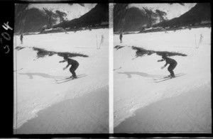 Unidentified skier, without poles, going down a slope, Mount Cook
