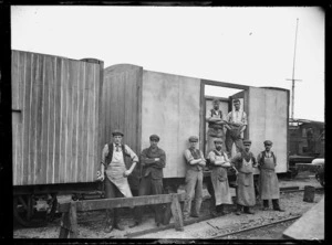 Group of workmen by "K" wagon Cool Trucks, 1900