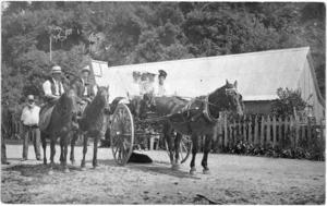 Group with horses, at Hendes Homestead, Harihari
