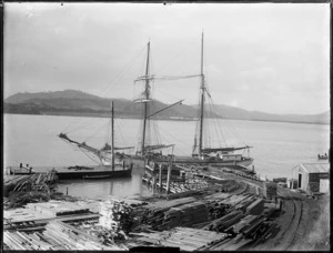 Topsail schooner, Houto, and timber, at a North Auckland wharf